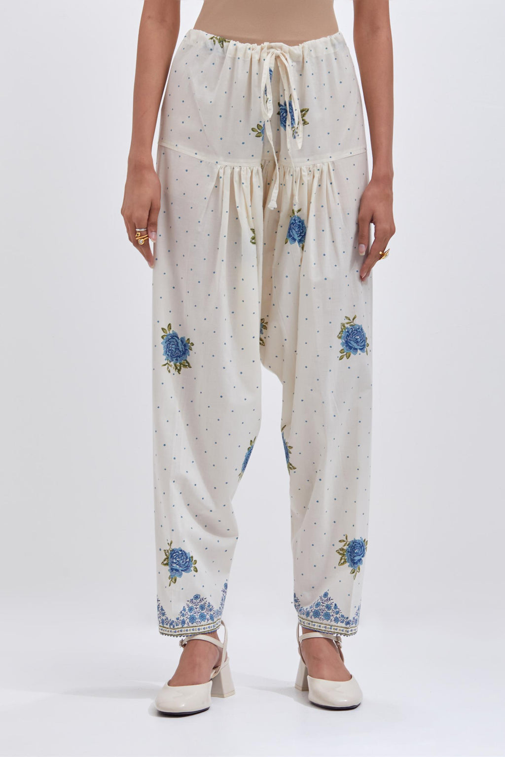 Off white cotton salwar with all-over blue & green floral hand block print.
