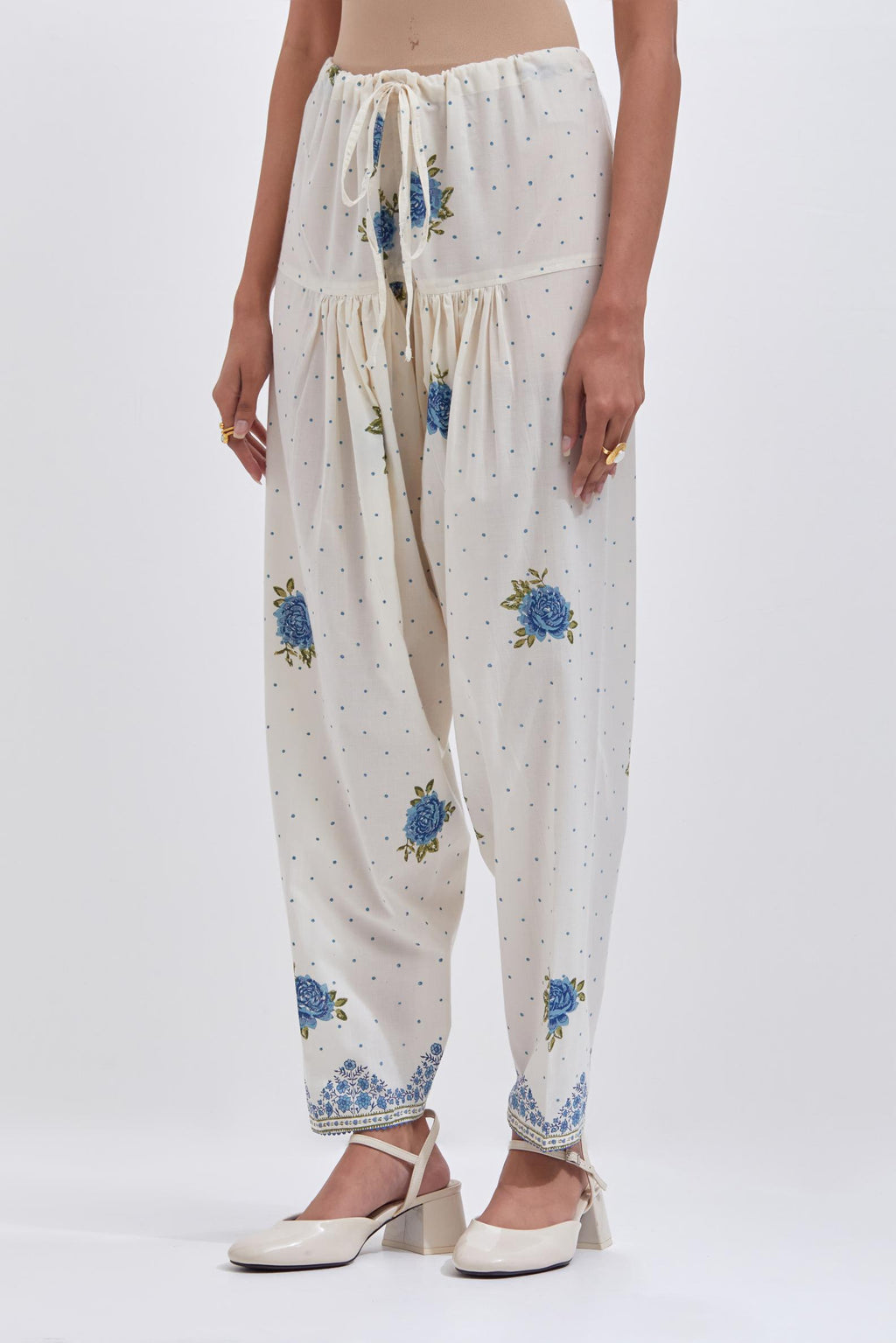 Off white cotton salwar with all-over blue & green floral hand block print.