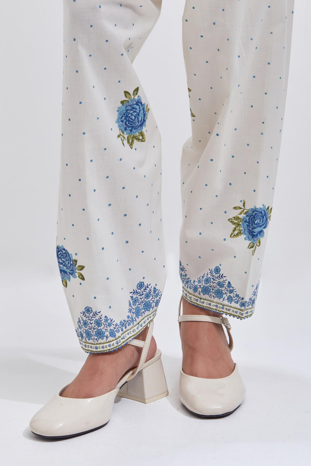 Off white cotton salwar with all-over blue & green floral hand block print.