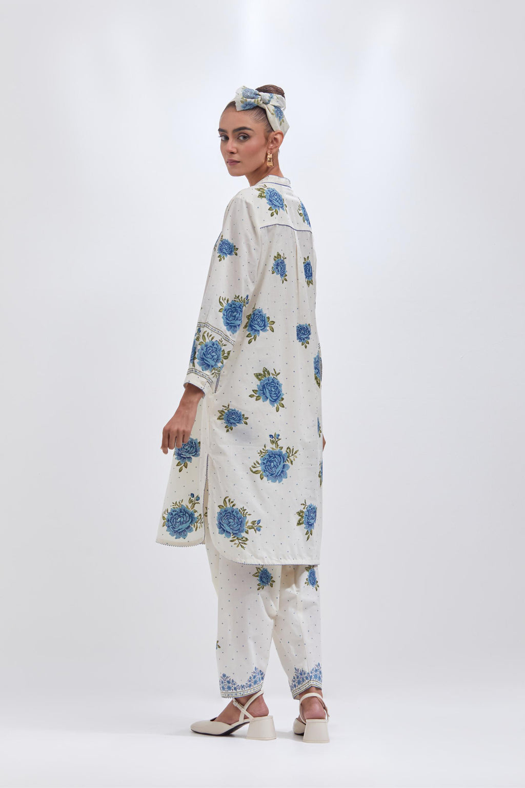 Off white cotton straight short kurta set with all-over blue & green floral hand block print.