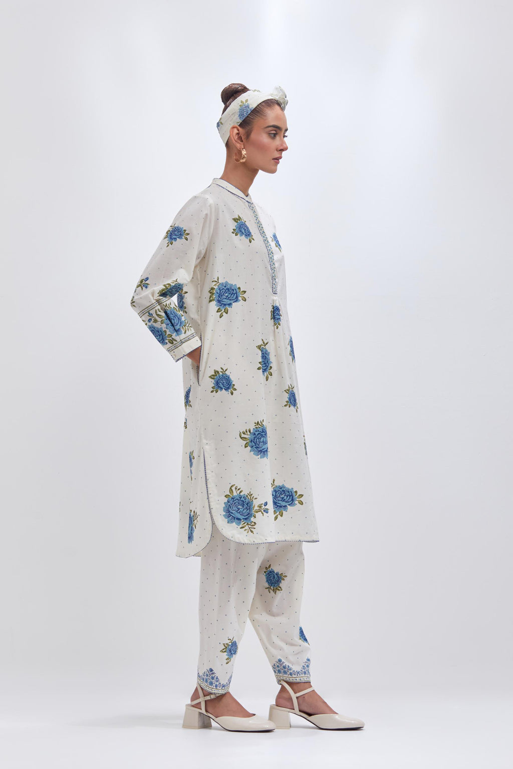 Off white cotton straight short kurta set with all-over blue & green floral hand block print.