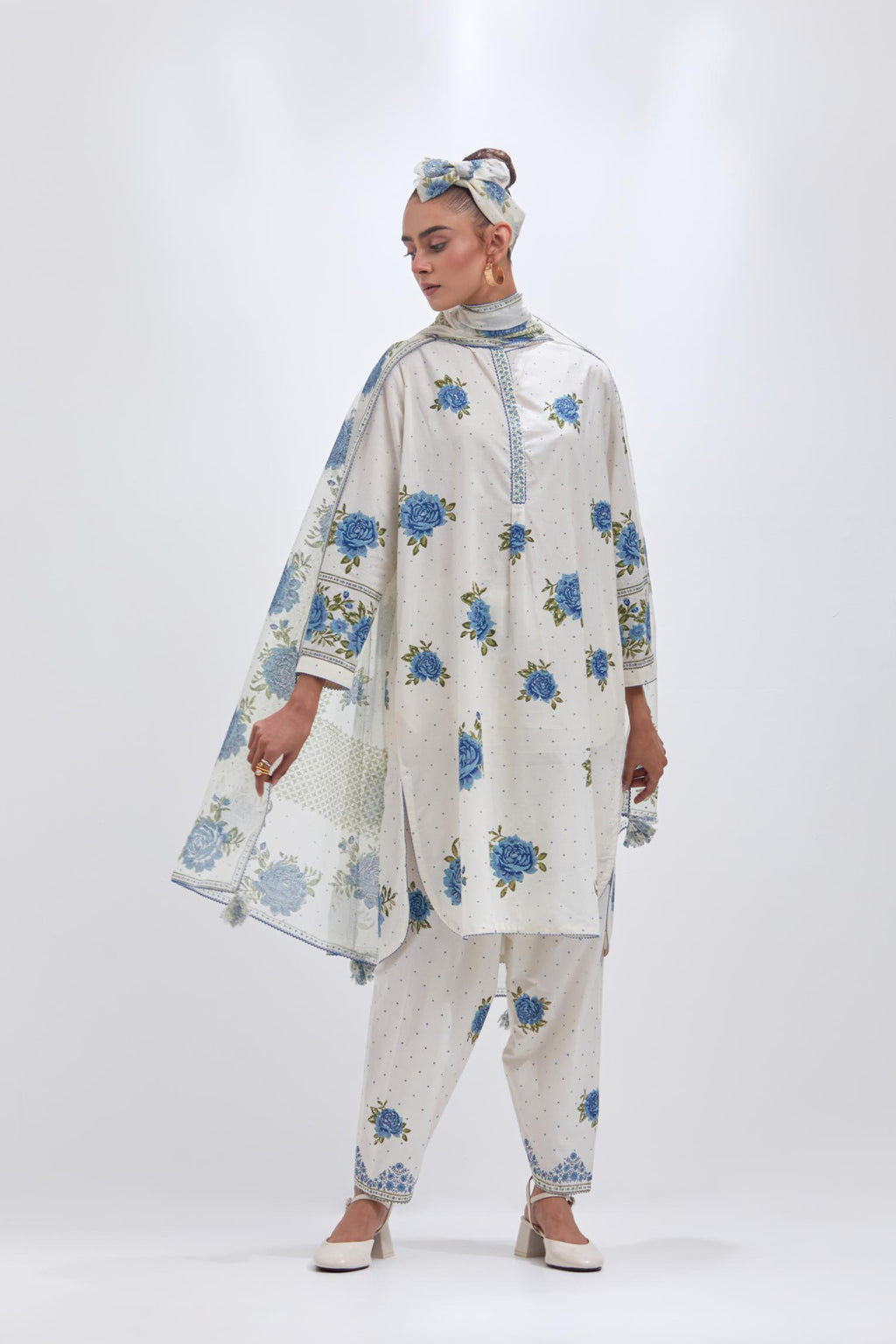 Off white cotton straight short kurta set with all-over blue & green floral hand block print.
