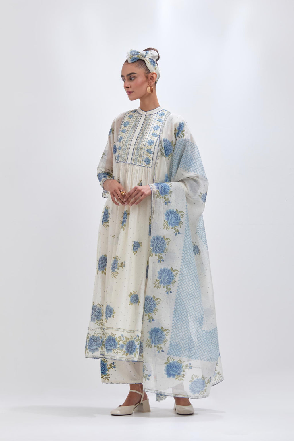 Off white cotton chanderi dupatta with all-over blue & green hand block print.