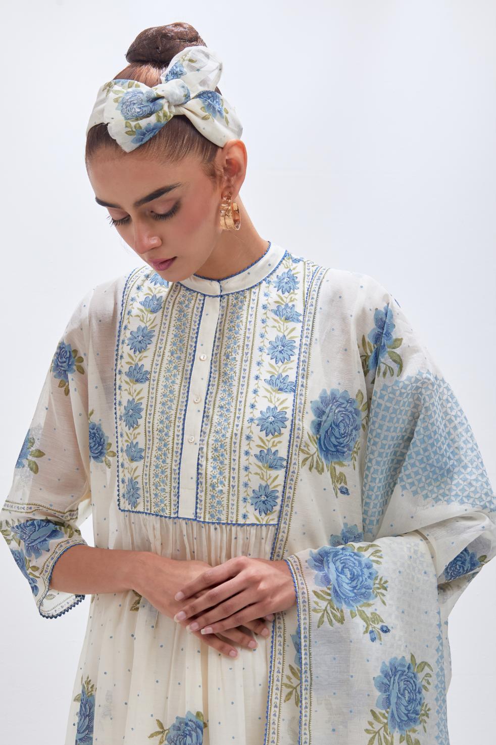 Off white cotton chanderi dupatta with all-over blue & green hand block print.