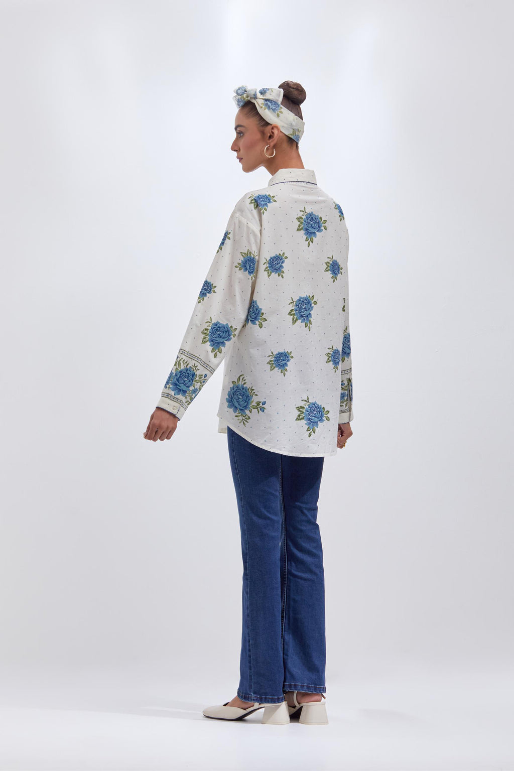 Off white cotton shirt with all-over blue & green floral hand block print and full sleeves.