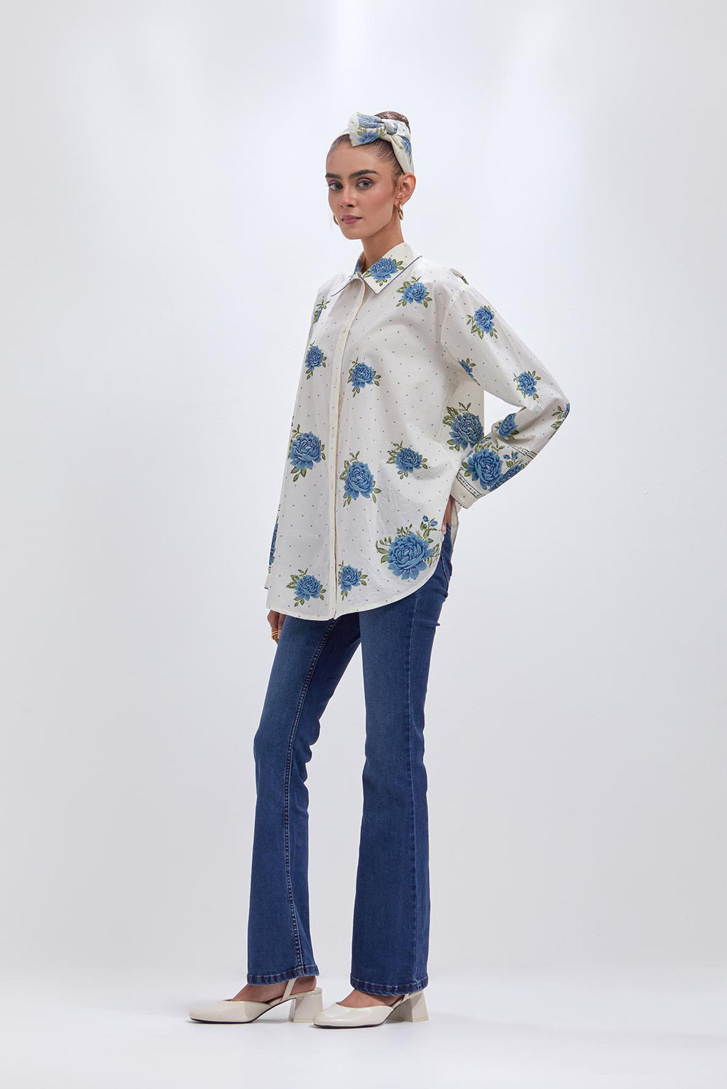 Off white cotton shirt with all-over blue & green floral hand block print and full sleeves.