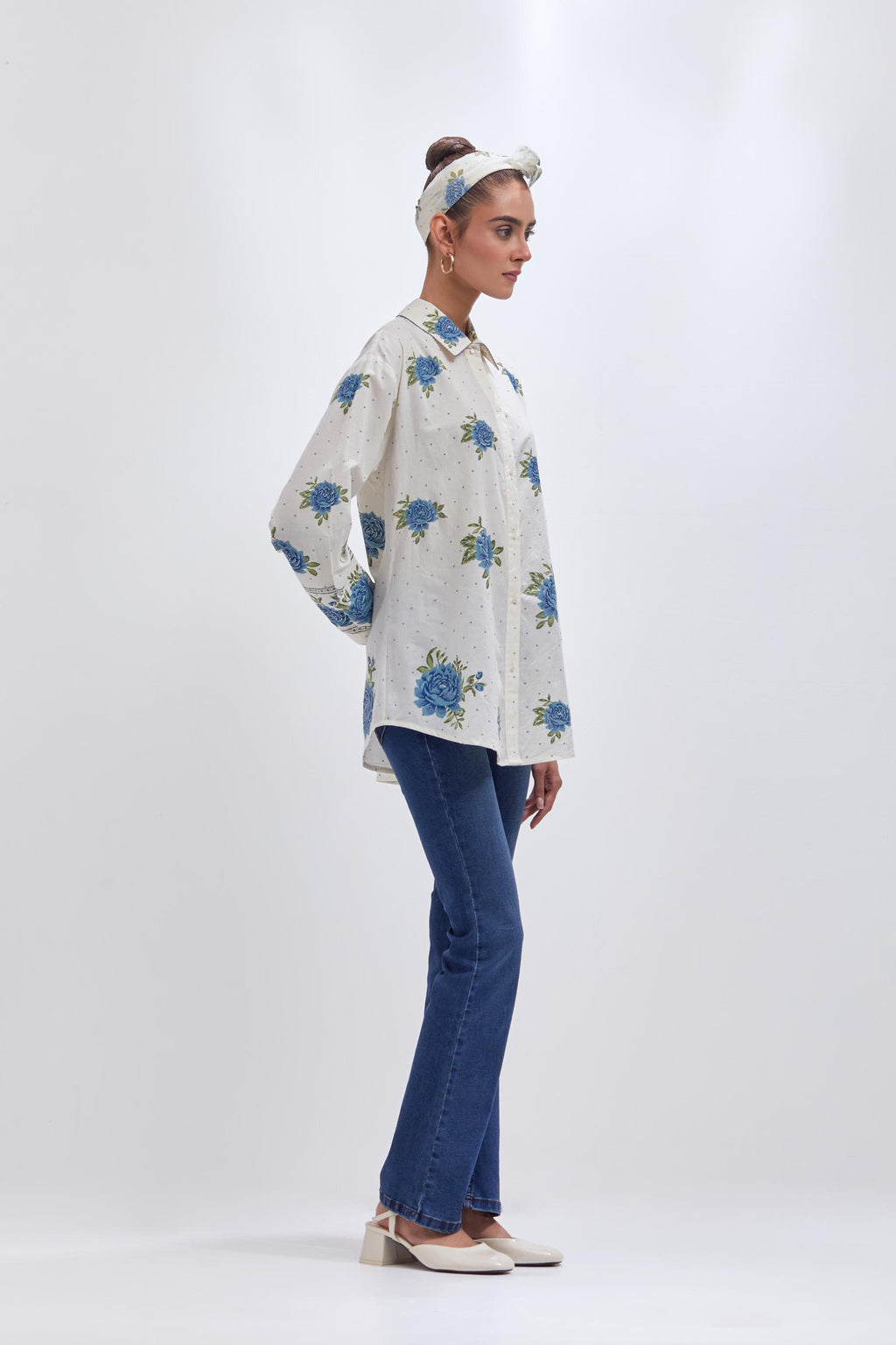 Off white cotton shirt with all-over blue & green floral hand block print and full sleeves.