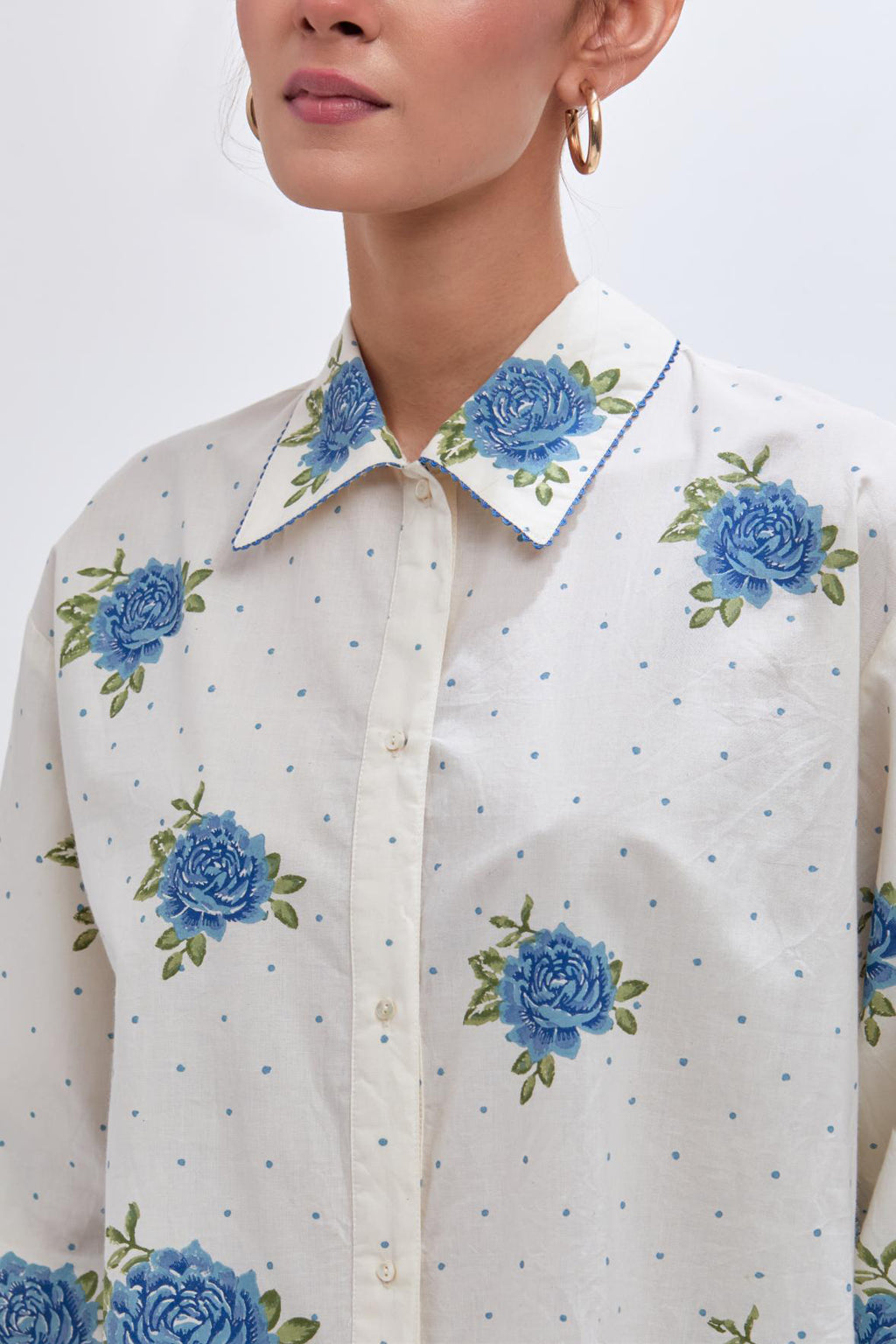 Off white cotton shirt with all-over blue & green floral hand block print and full sleeves.