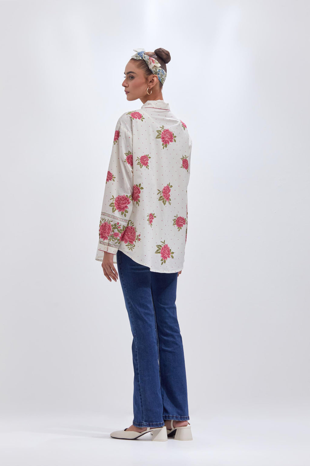 Off white cotton shirt with all-over pink & green floral hand block print and full sleeves.