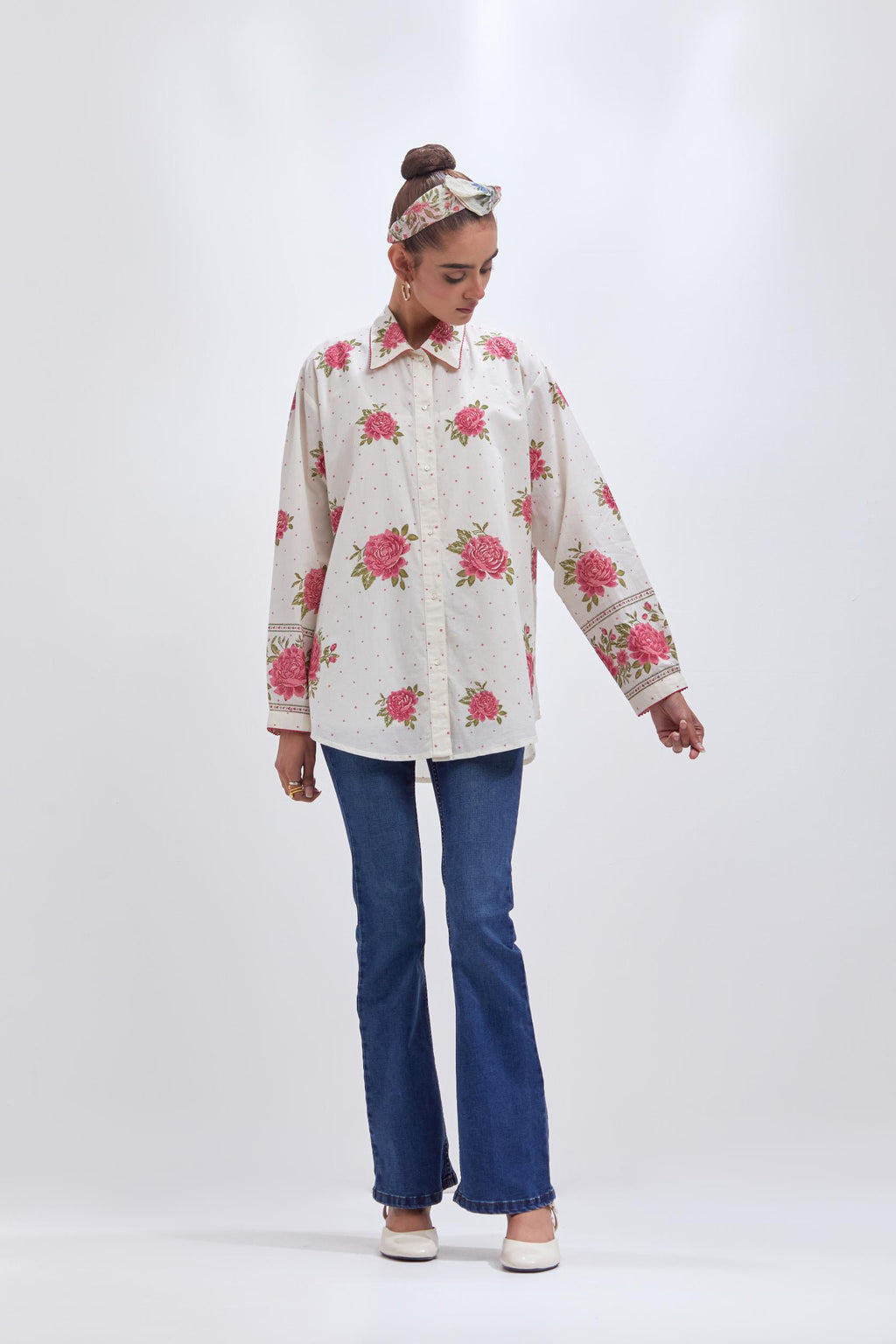 Off white cotton shirt with all-over pink & green floral hand block print and full sleeves.
