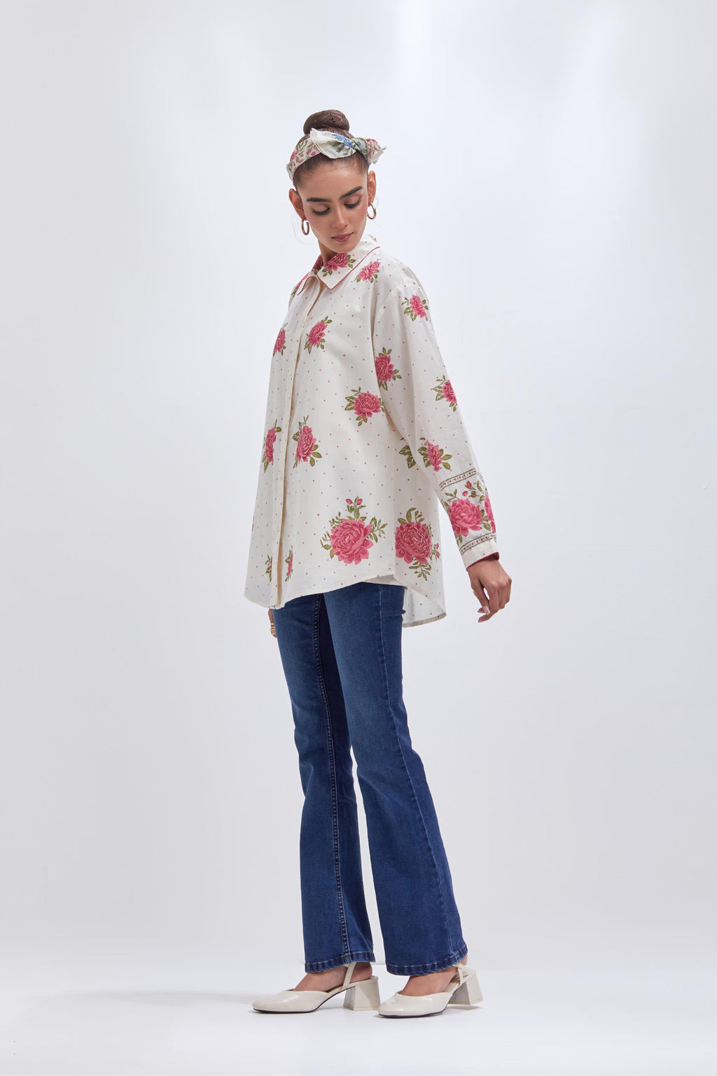 Off white cotton shirt with all-over pink & green floral hand block print and full sleeves.