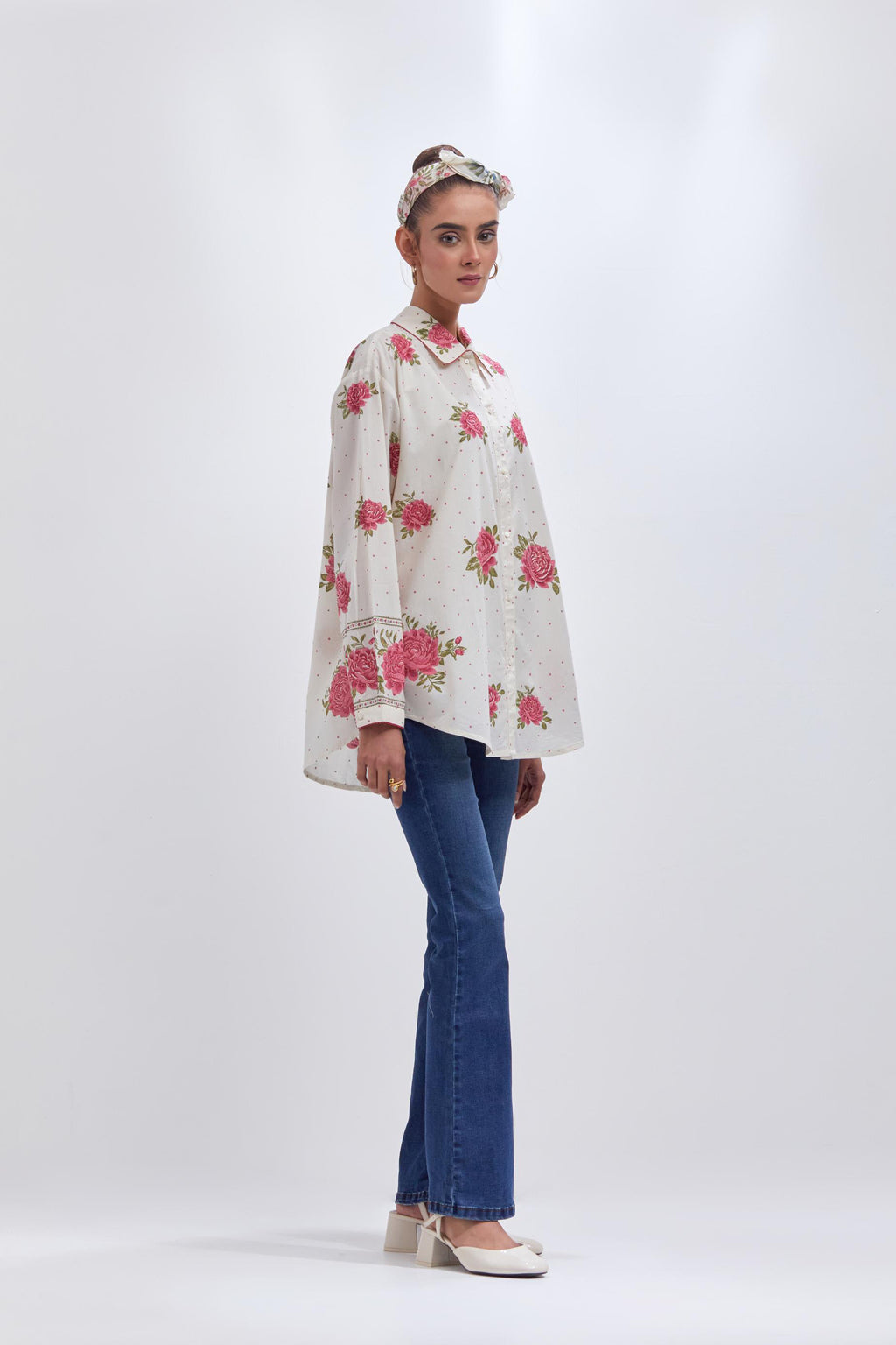 Off white cotton shirt with all-over pink & green floral hand block print and full sleeves.