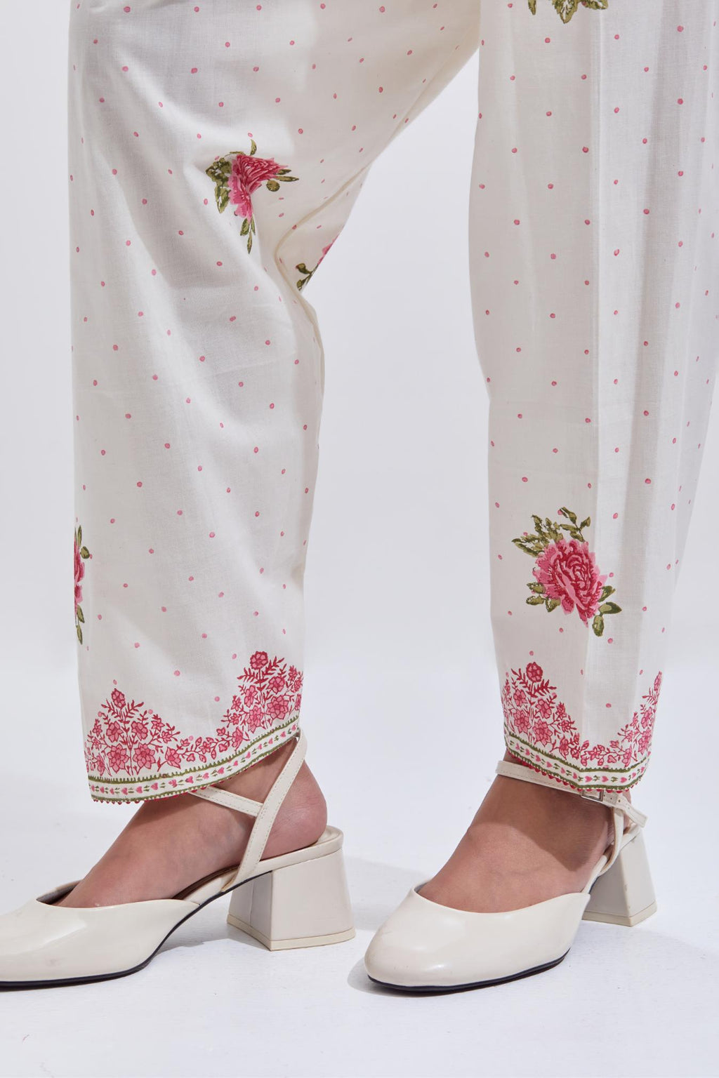 Off white cotton salwar with all-over pink & green floral hand block print.