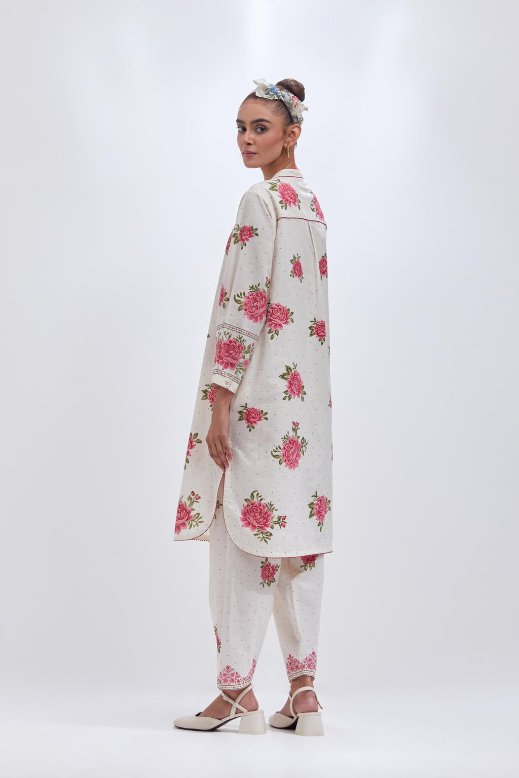 Off white cotton straight short kurta set with all-over pink & green floral hand block print.