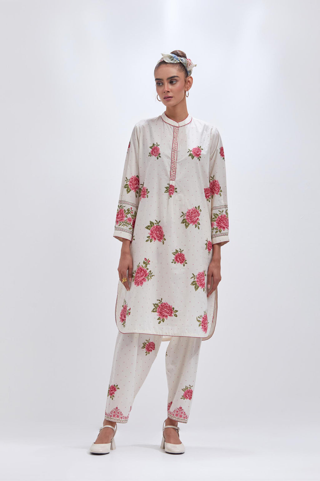 Off white cotton straight short kurta set with all-over pink & green floral hand block print.