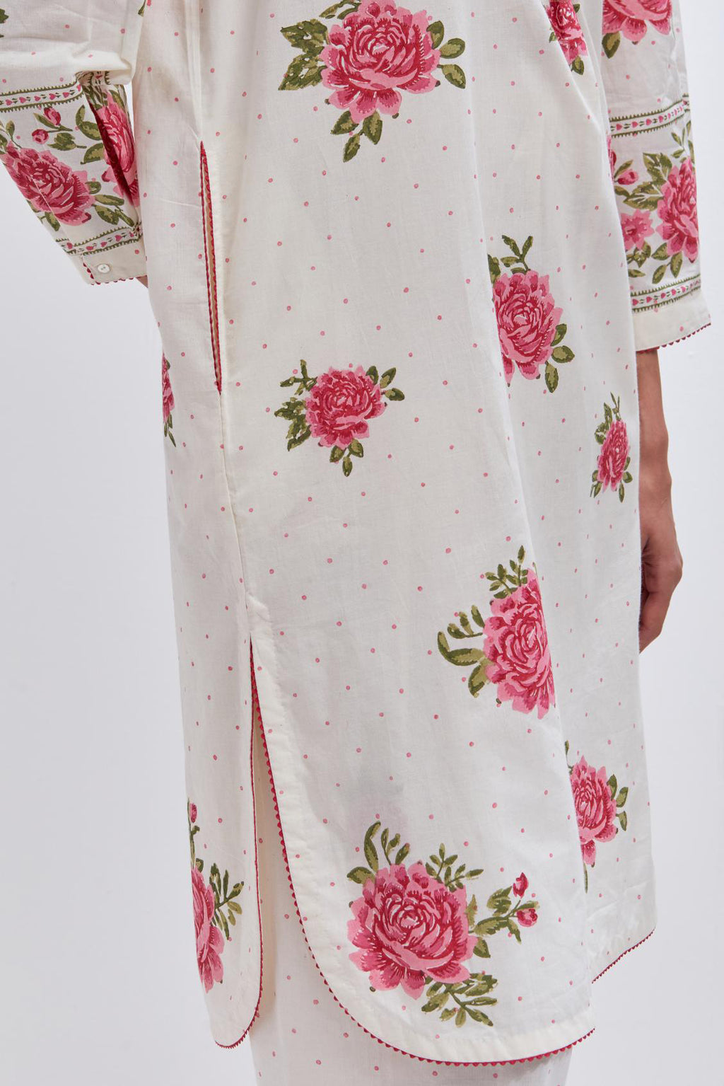 Off white cotton straight short kurta set with all-over pink & green floral hand block print.