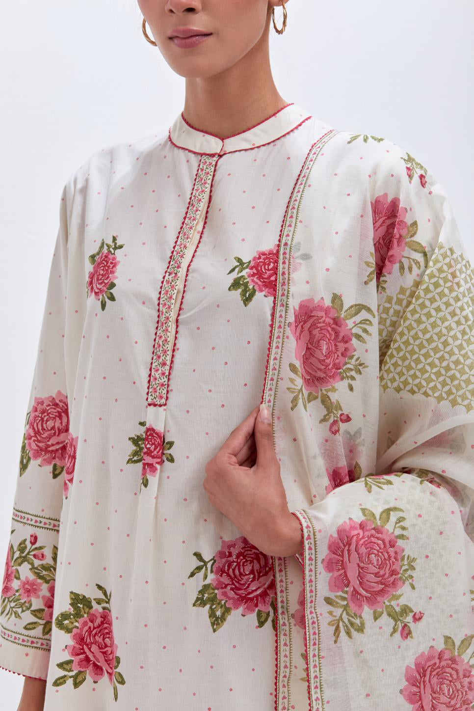 Off white cotton chanderi dupatta with all-over pink & green hand block print.