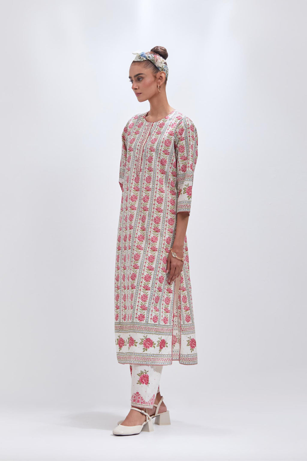 Off white cotton straight kurta set with all-over pink & green floral hand block printed.