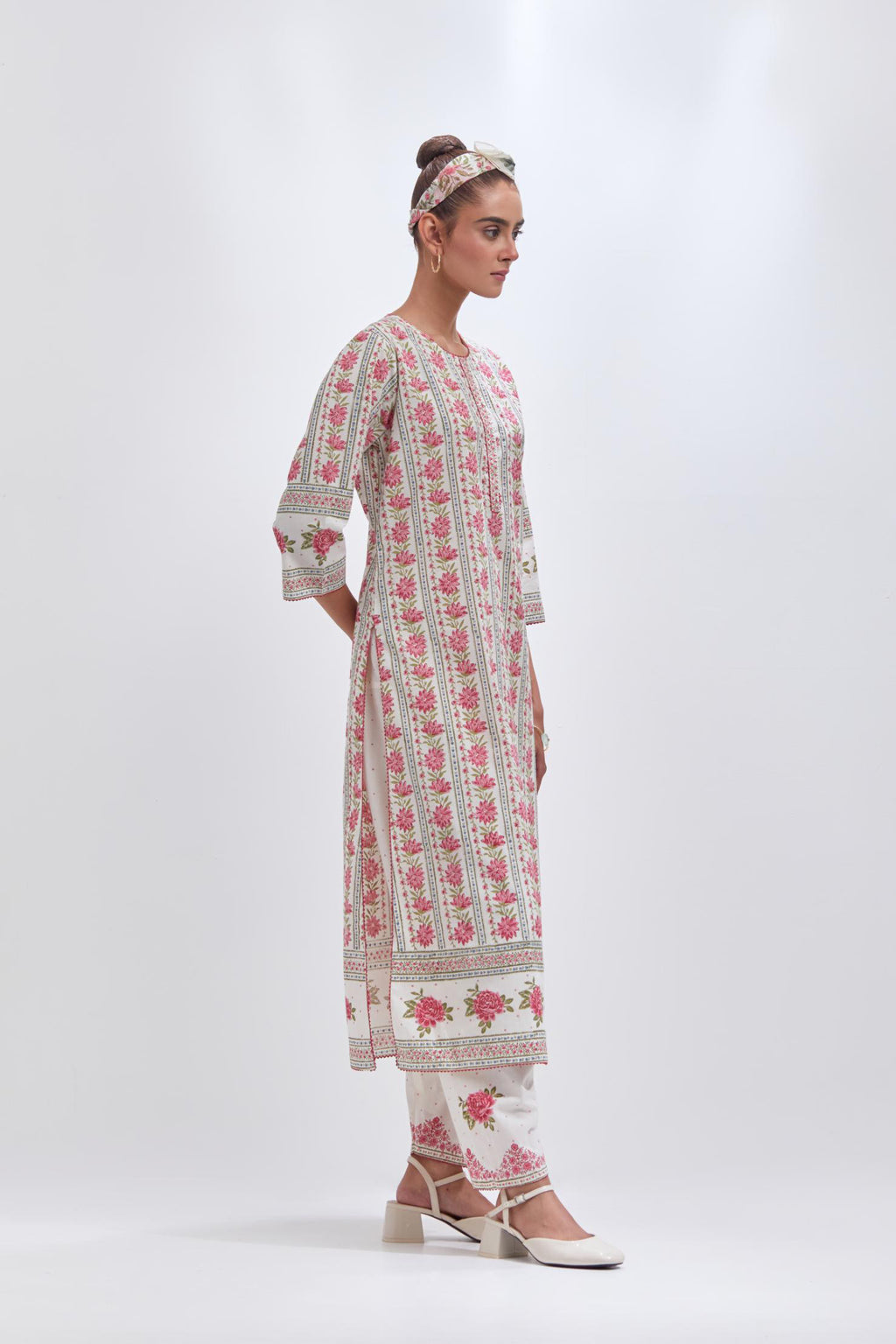 Off white cotton straight kurta set with all-over pink & green floral hand block printed.