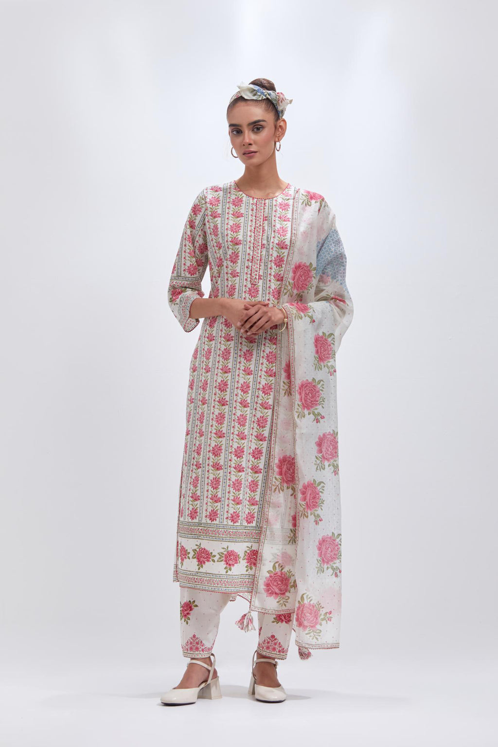 Off white cotton straight kurta set with all-over pink & green floral hand block printed.