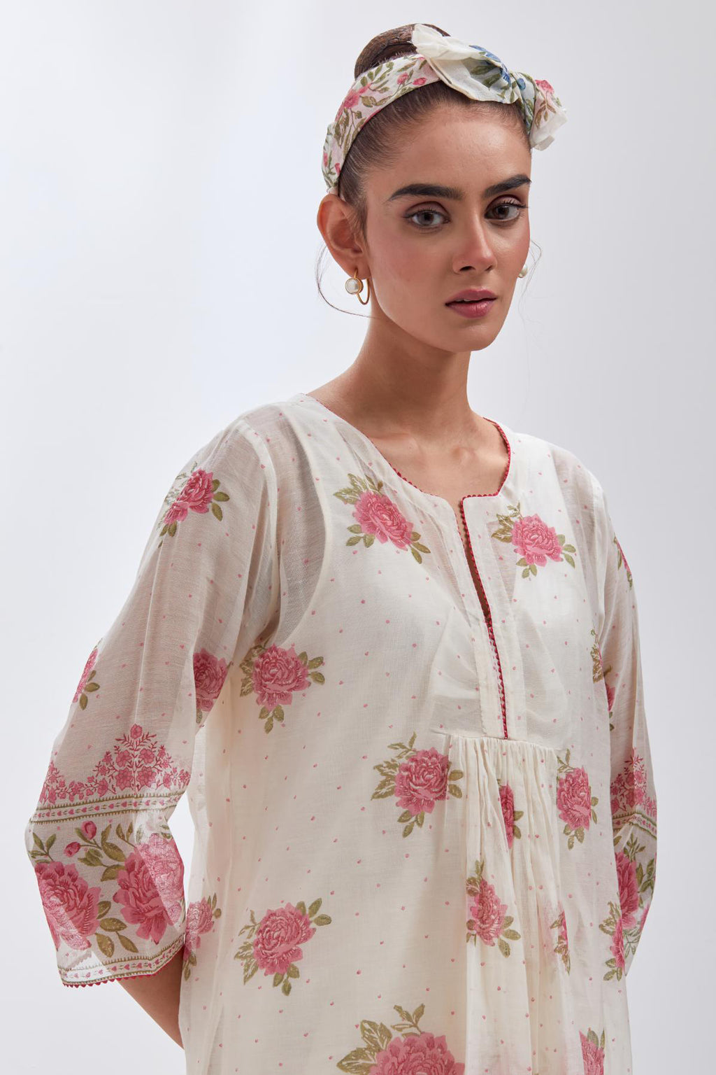 Off white cotton Chanderi straight long kurta dress set with all-over pink & green hand block print.