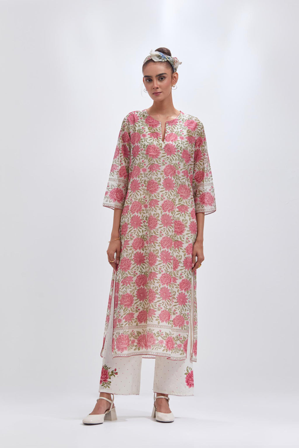 Off white cotton chanderi straight kurta set with all-over pink and green floral hand block print.