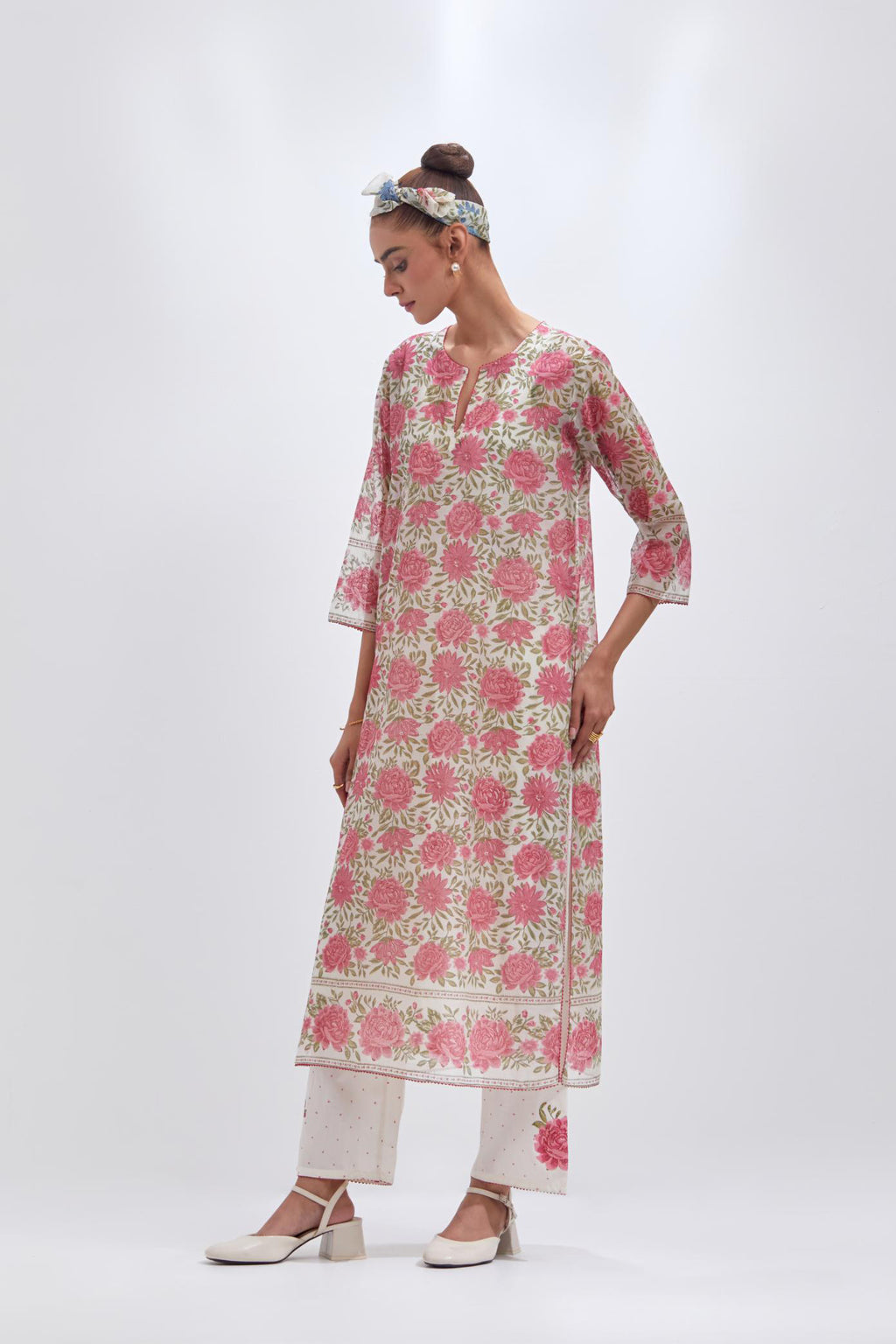 Off white cotton chanderi straight kurta set with all-over pink and green floral hand block print.