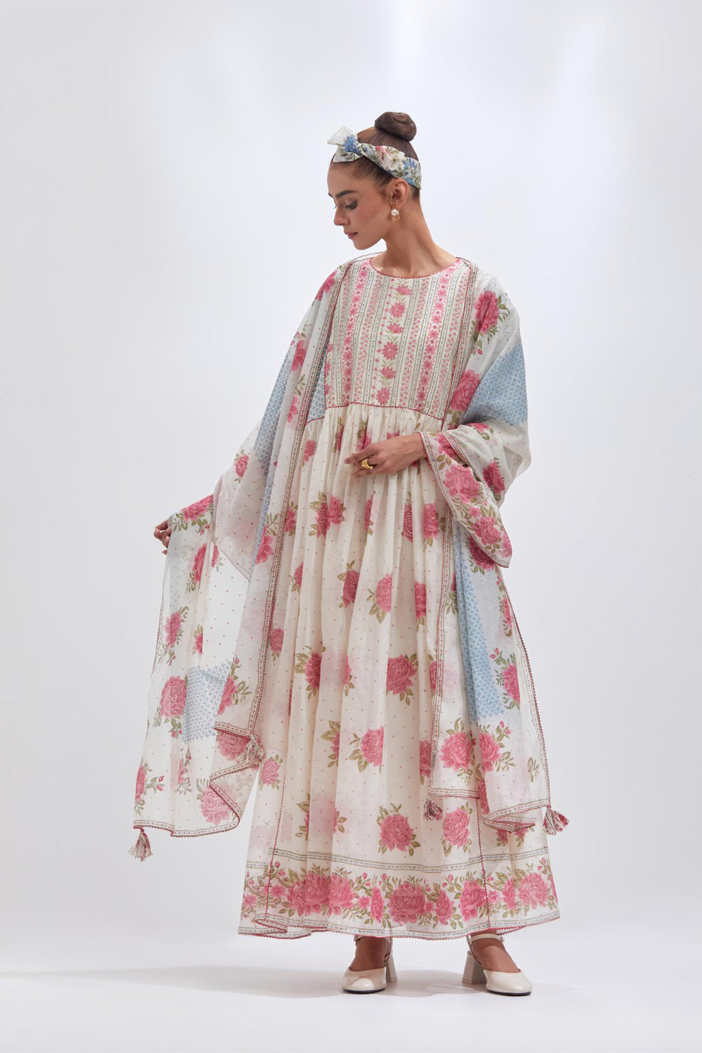 Off white cotton chanderi dupatta with all-over blue & pink hand block print.