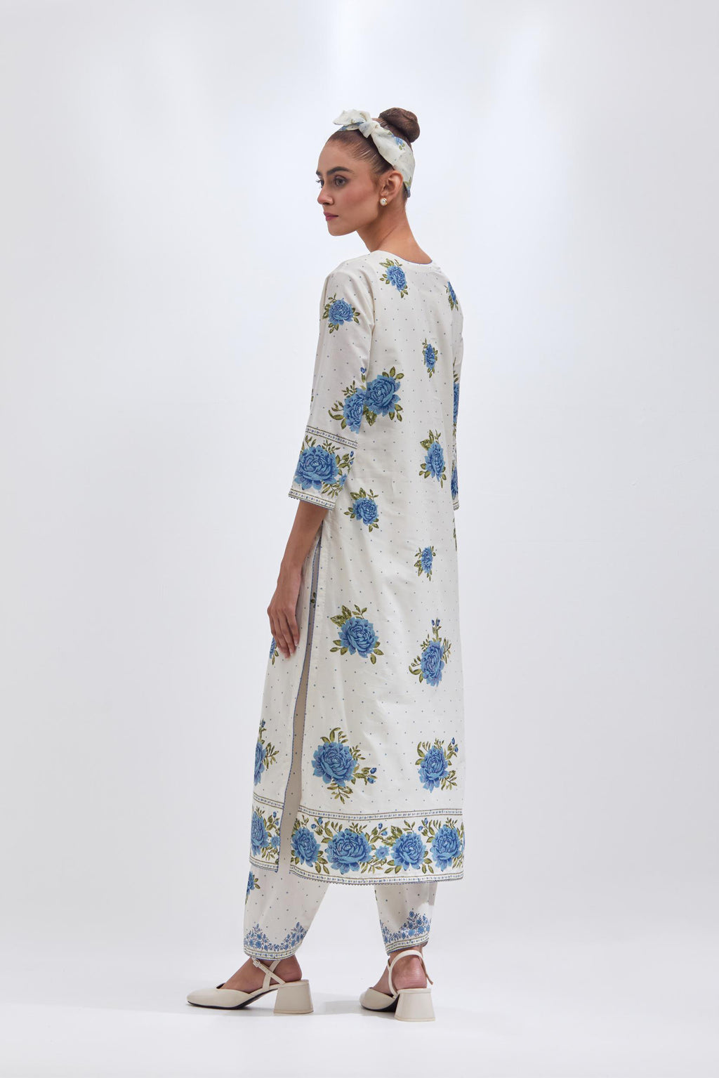 Off white cotton straight kurta set with all-over blue & green floral hand block print.