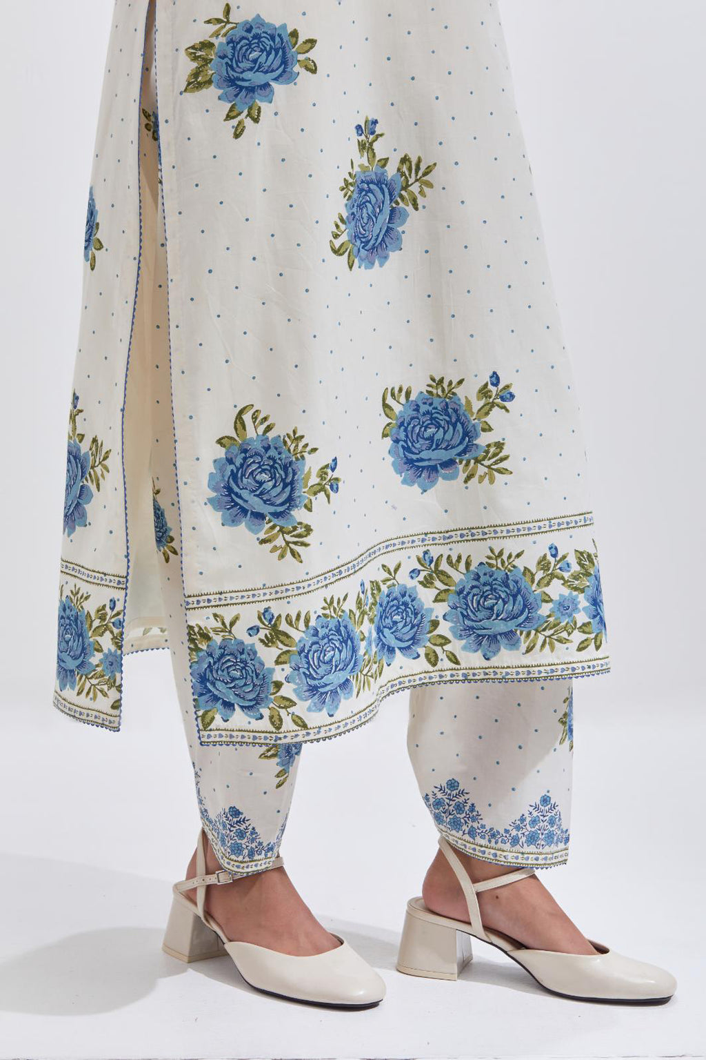 Off white cotton straight kurta set with all-over blue & green floral hand block print.