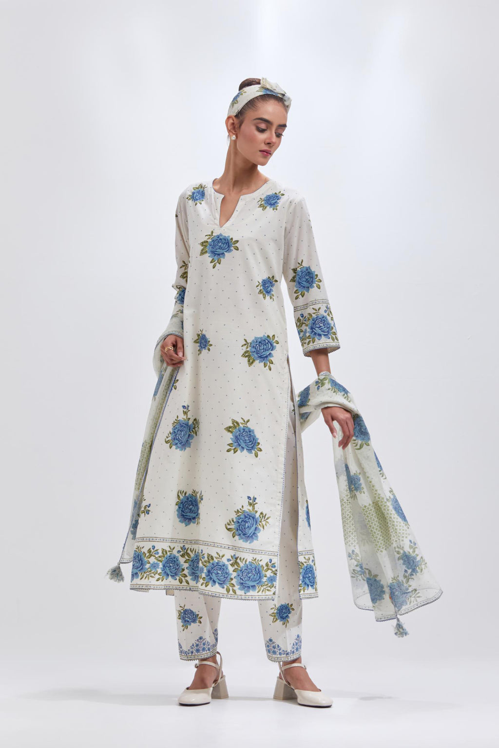 Off white cotton straight kurta set with all-over blue & green floral hand block print.
