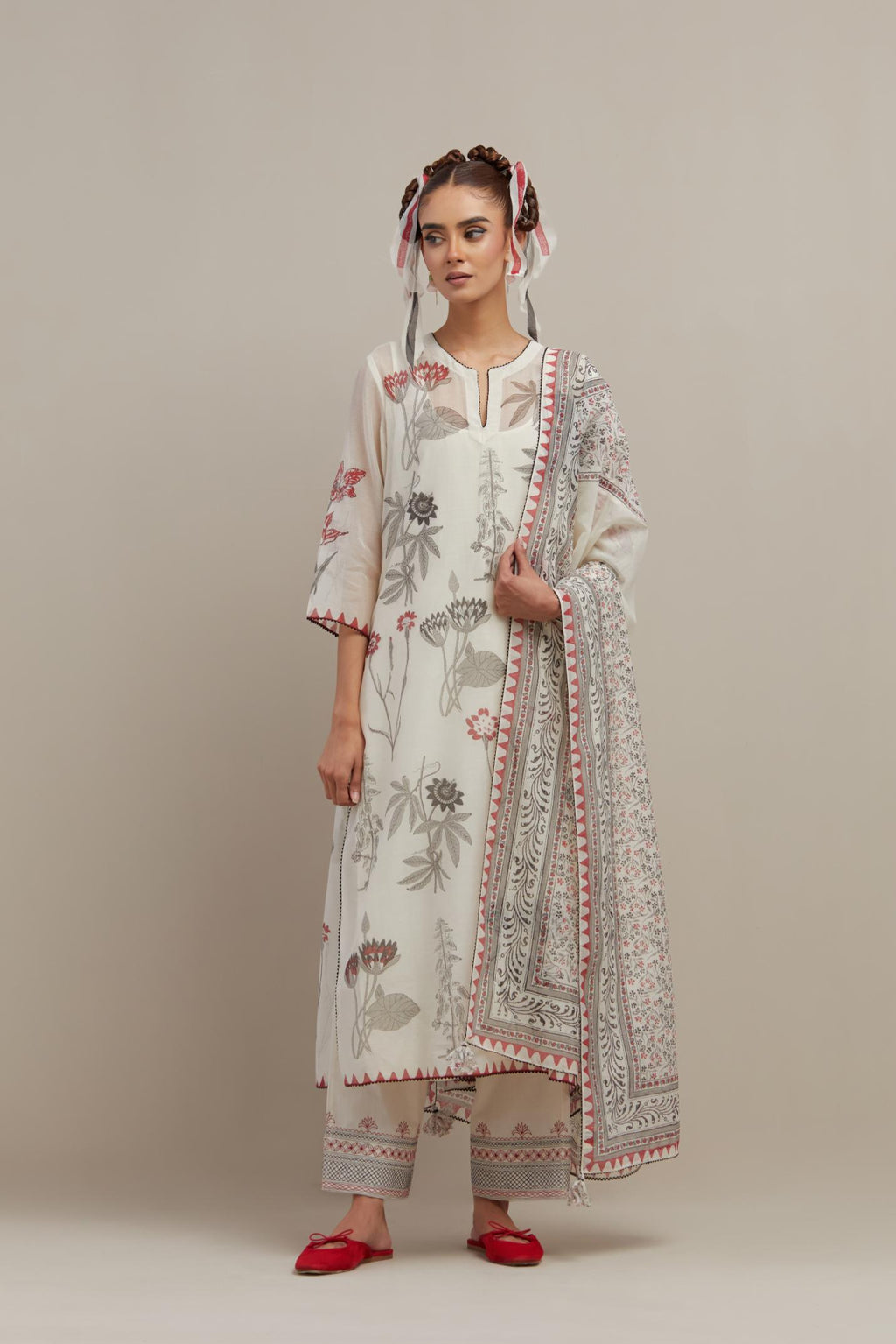 Off white cotton chanderi dupatta with all-over hand block print.