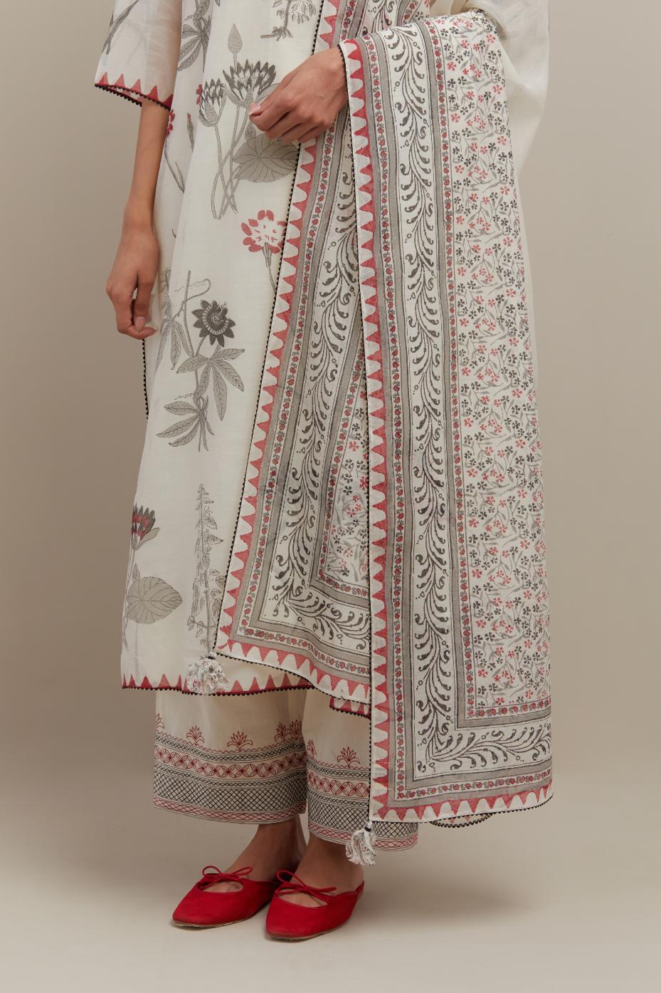 Off white cotton chanderi dupatta with all-over hand block print.