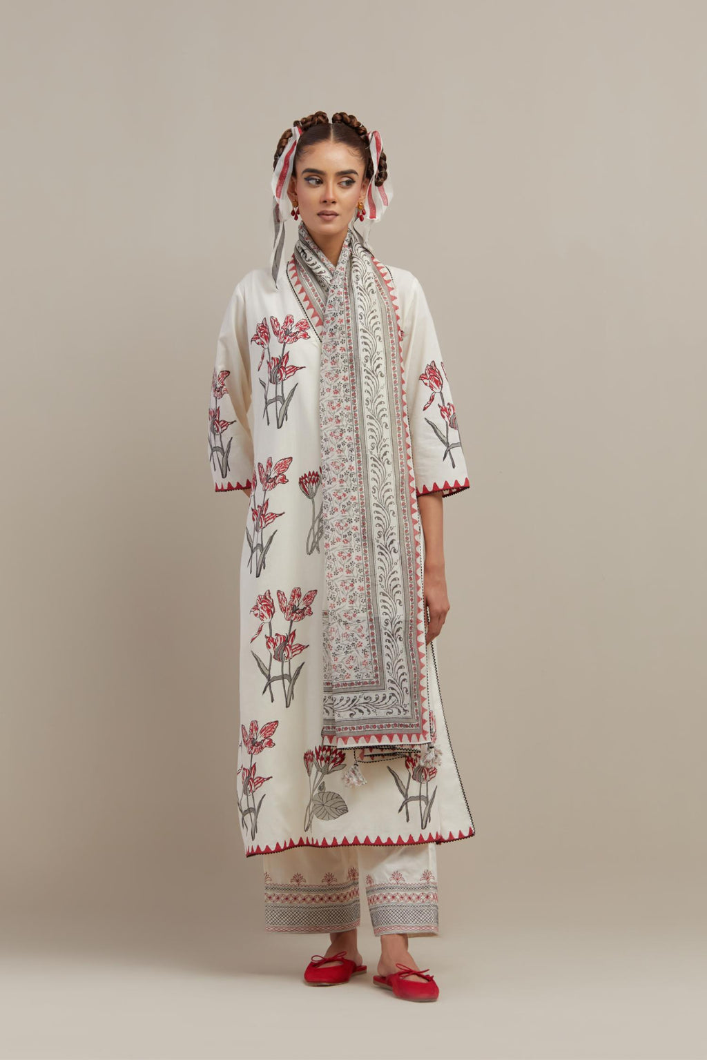 Off white cotton chanderi dupatta with all-over hand block print.