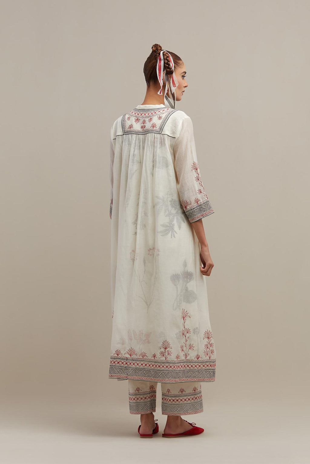 Off white cotton chanderi Kurta dress set with quilted embroidered yoke and hand block printed cotton slip inside.