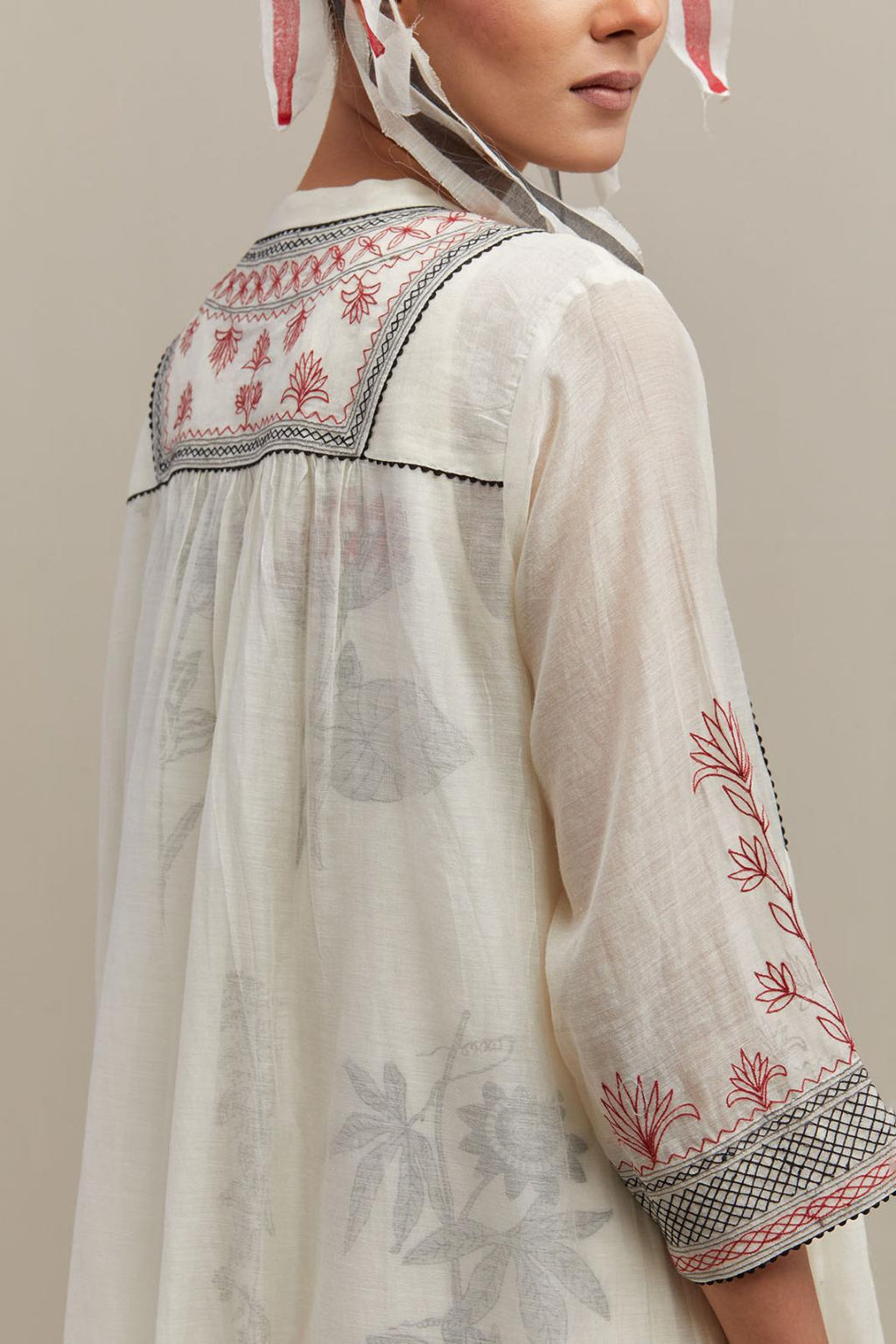 Off white cotton chanderi Kurta dress set with quilted embroidered yoke and hand block printed cotton slip inside.