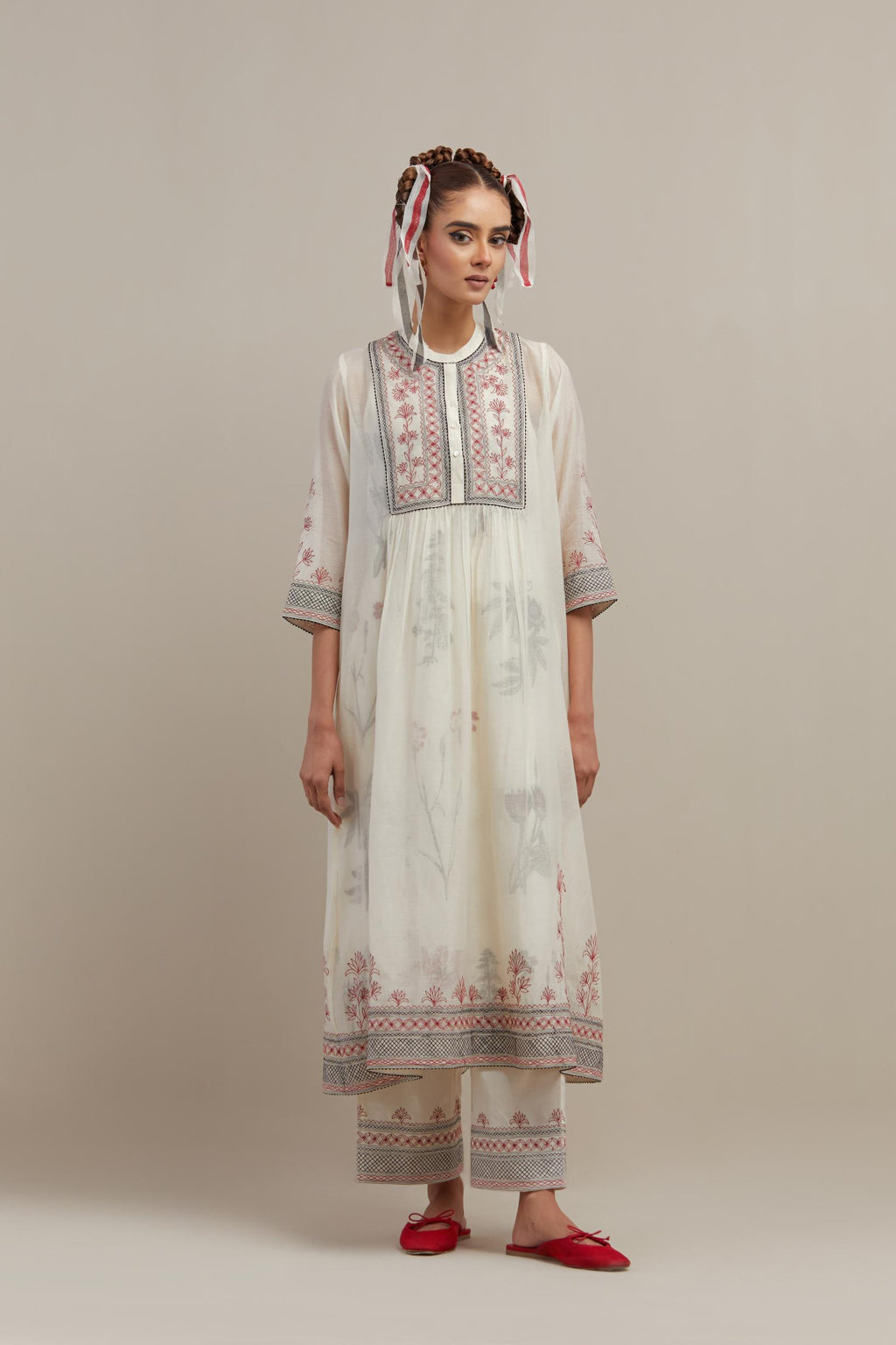 Off white cotton chanderi Kurta dress set with quilted embroidered yoke and hand block printed cotton slip inside.