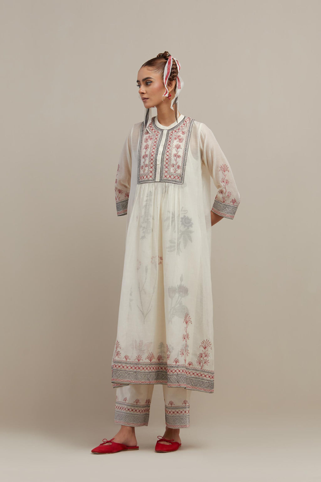 Off white cotton chanderi Kurta dress set with quilted embroidered yoke and hand block printed cotton slip inside.