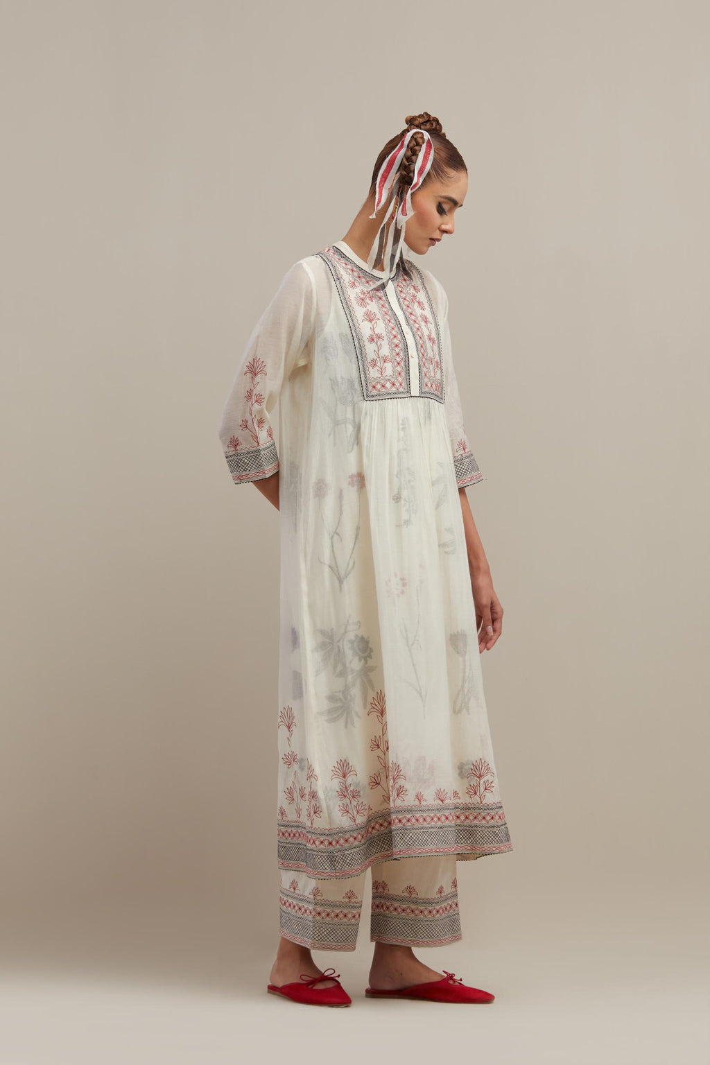 Off white cotton chanderi Kurta dress set with quilted embroidered yoke and hand block printed cotton slip inside.