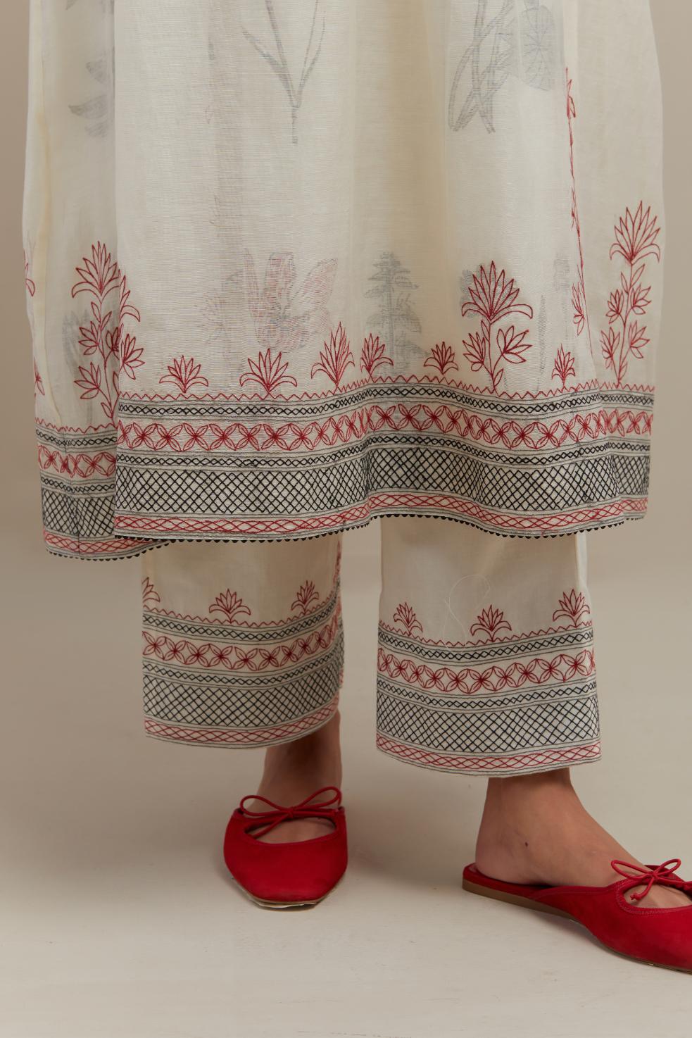 Off white cotton chanderi Kurta dress set with quilted embroidered yoke and hand block printed cotton slip inside.