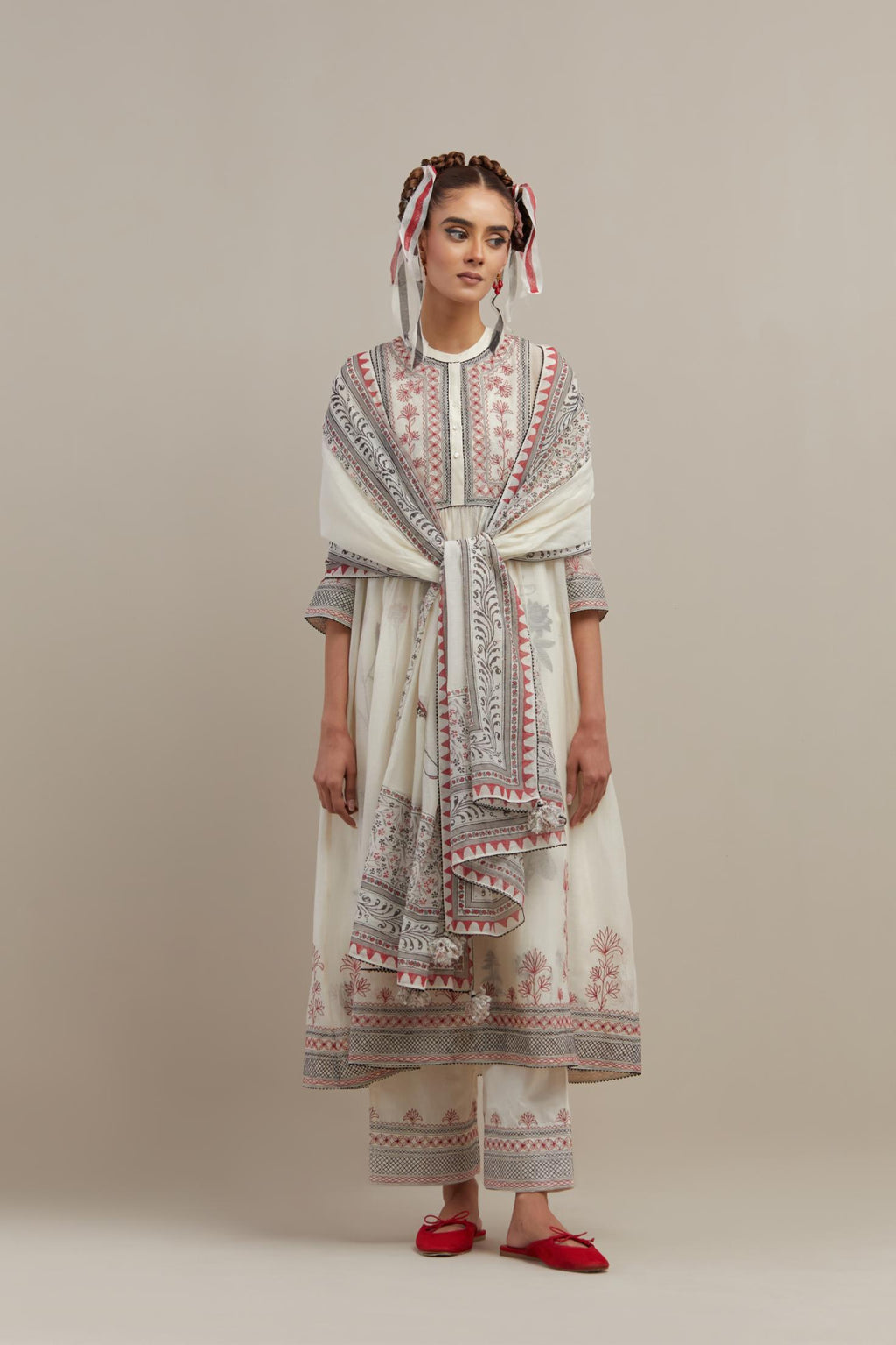 Off white cotton chanderi Kurta dress set with quilted embroidered yoke and hand block printed cotton slip inside.