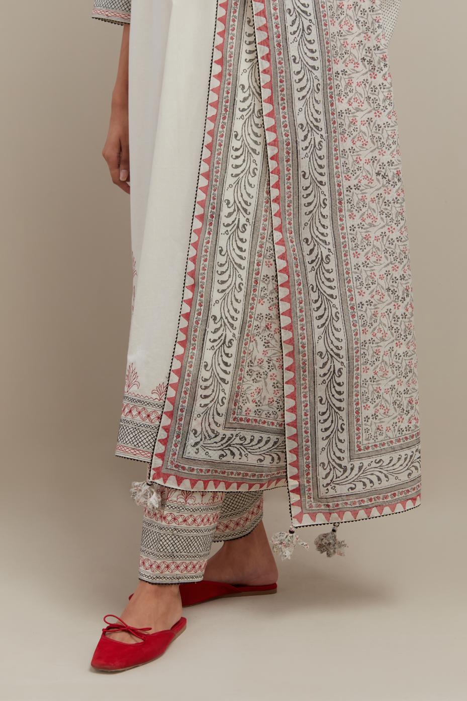 Off white cotton chanderi dupatta with all-over hand block print.