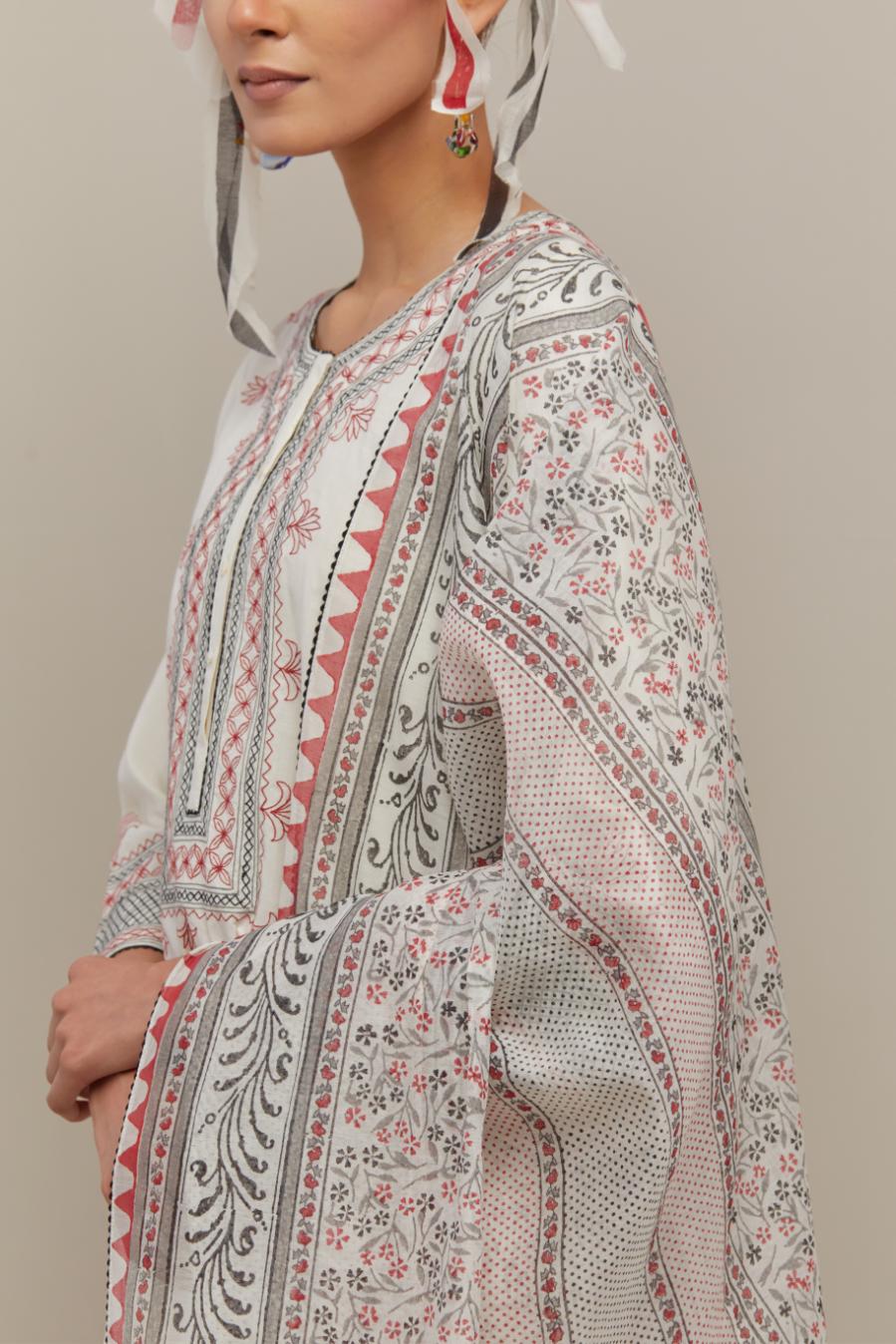 Off white cotton chanderi dupatta with all-over hand block print.