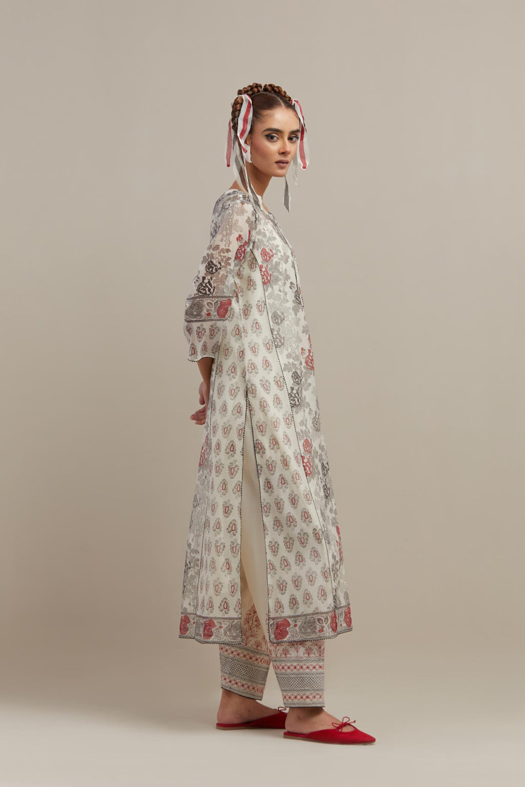 Off white cotton chanderi hand-block printed kurta set with side panels. highlighted with ricrac