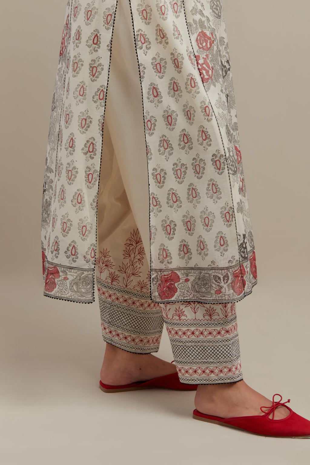 Off white cotton chanderi hand-block printed kurta set with side panels. highlighted with ricrac