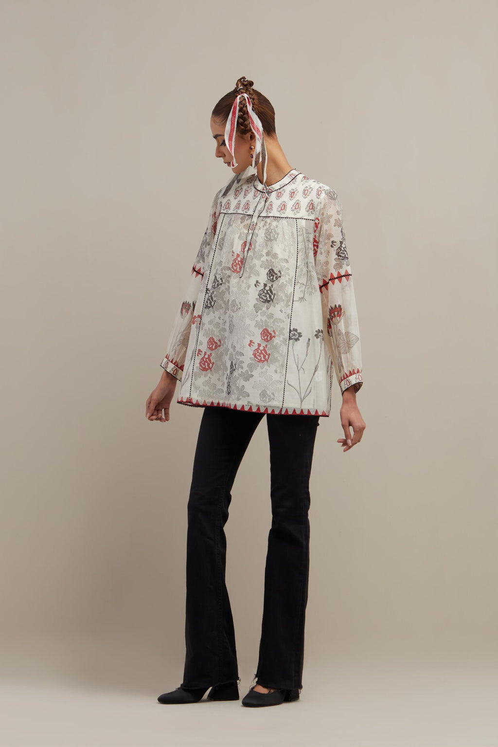 Off white cotton chanderi straight short top with all-over red & black hand block print.