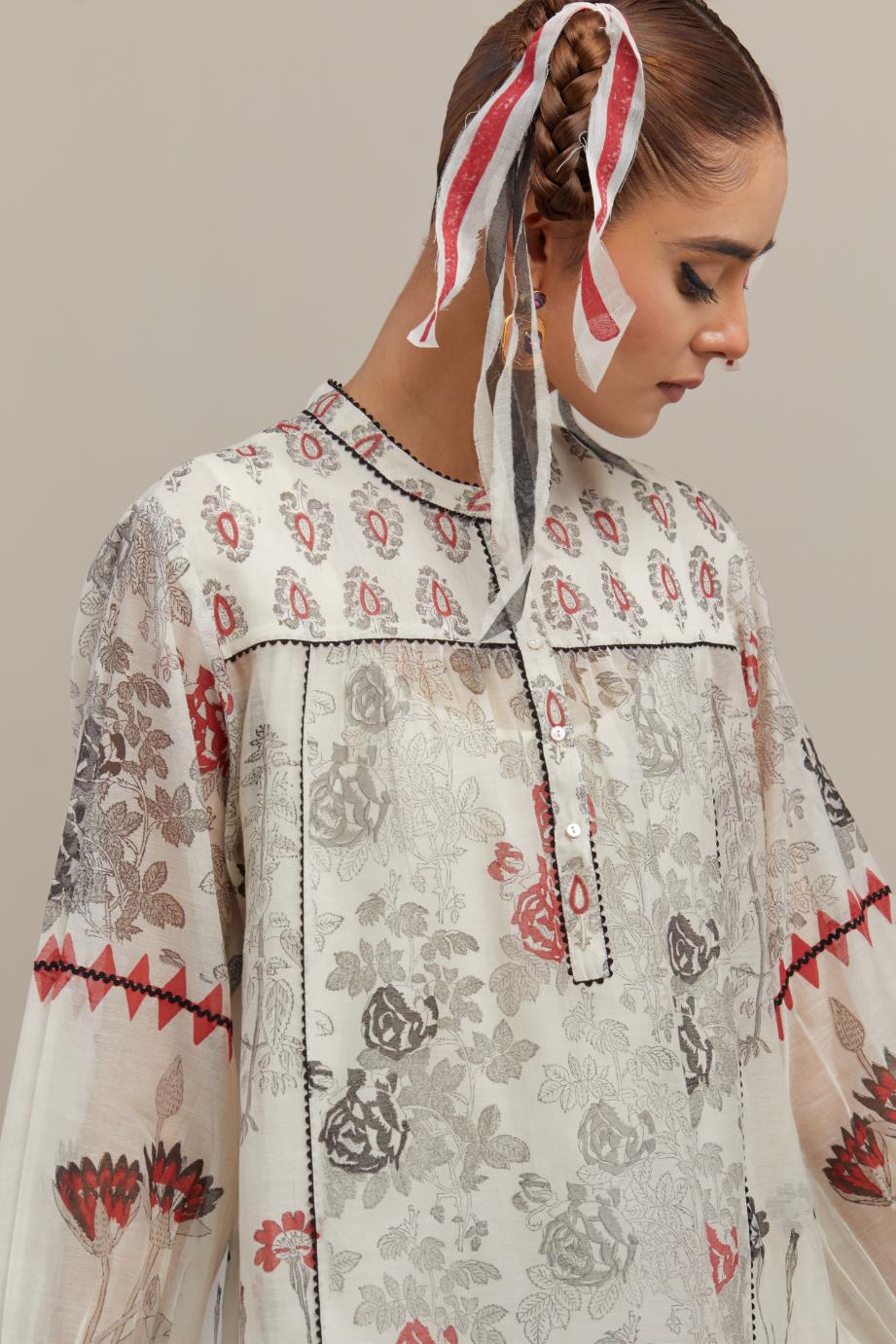 Off white cotton chanderi straight short top with all-over red & black hand block print.