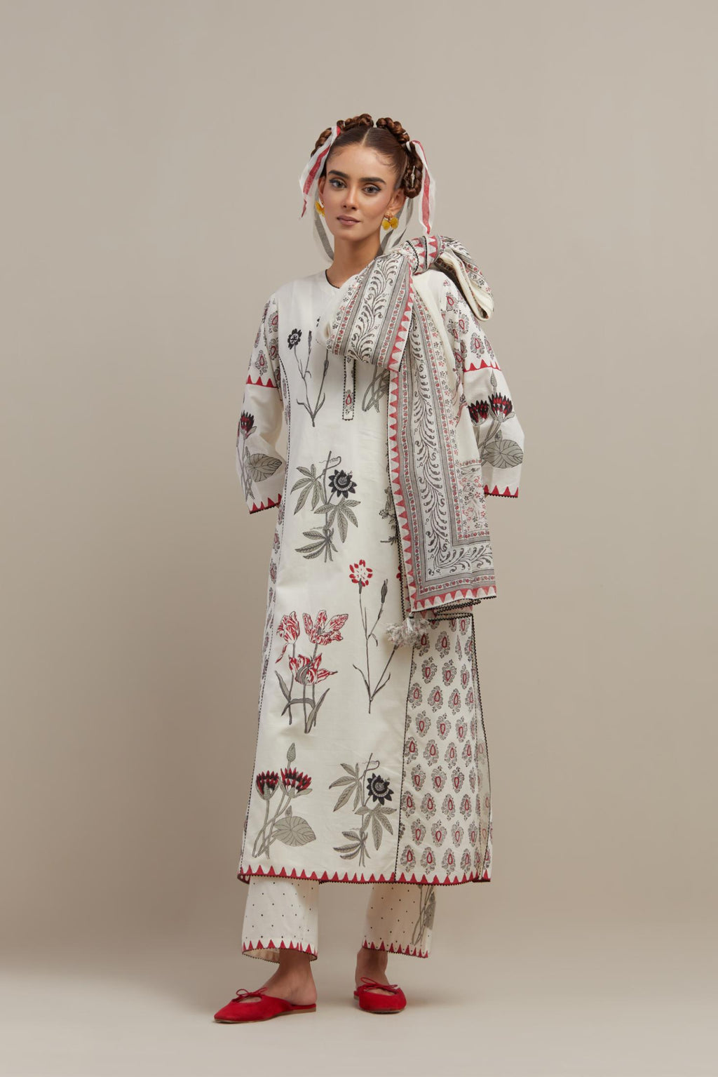 Off white cotton hand-block printed kurta set with side panels highlighted with ricrac.