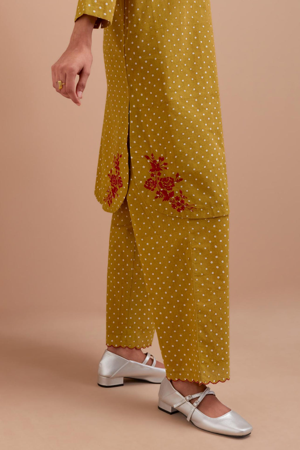 Olive Yellow Cotton straight short kurta set with all-over polka dot hand block print & embroidered floral bootas at the side hem.