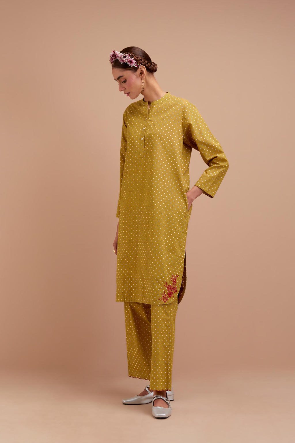 Olive Yellow Cotton straight short kurta set with all-over polka dot hand block print & embroidered floral bootas at the side hem.